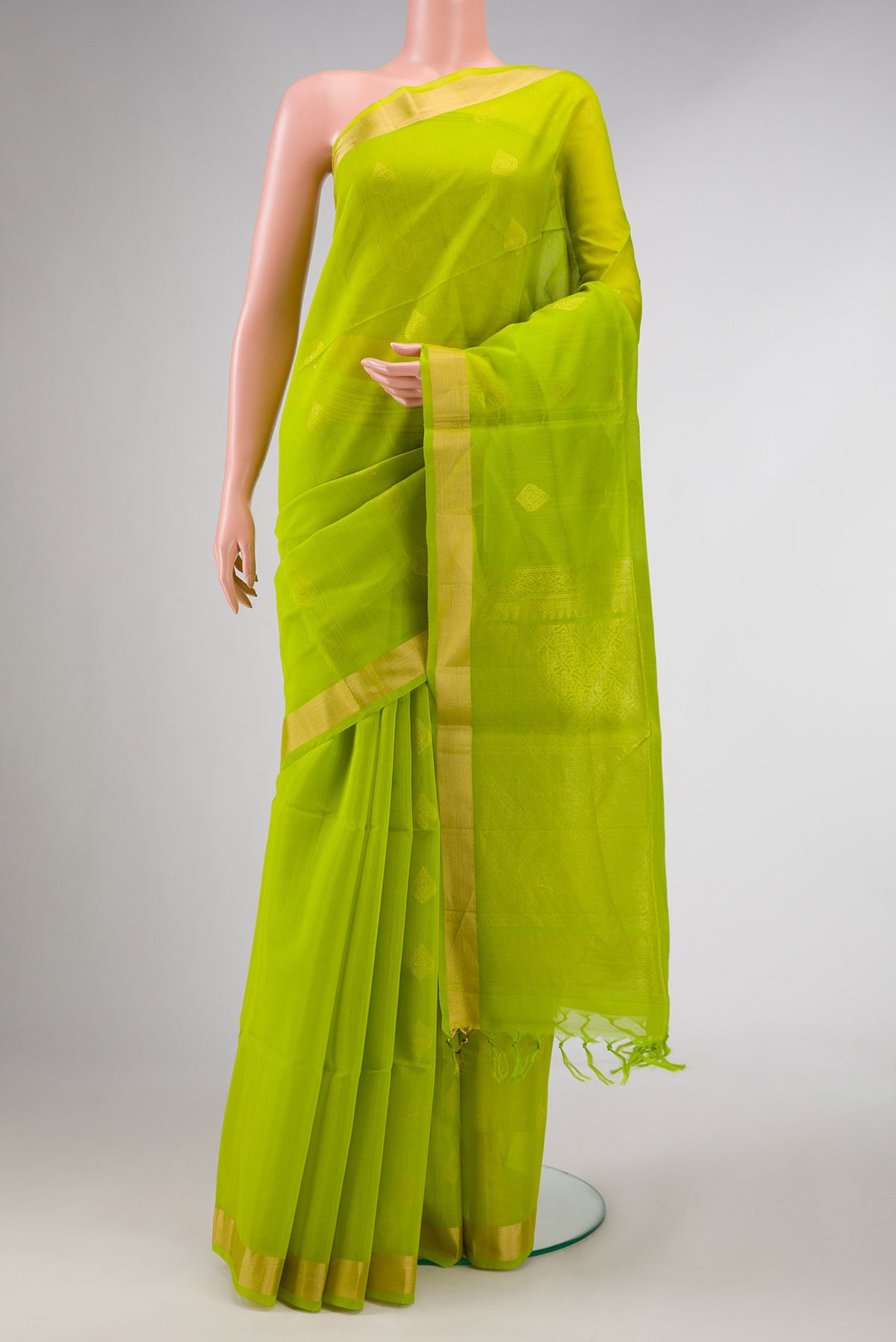 Parrot Green Dual Tone Silk Cotton Saree with Zari Butta on the body and Zari Border displayed on a mannequin
