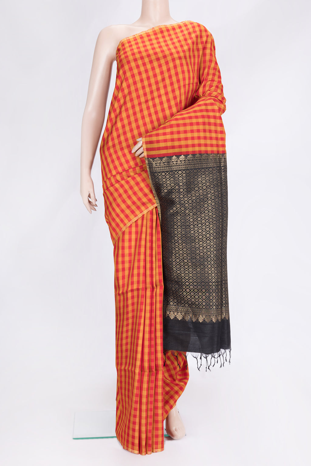 Red and Mustard Color Raw Silk Saree with Checked design on the body and Thin Zari Line.  displayed on a mannequin