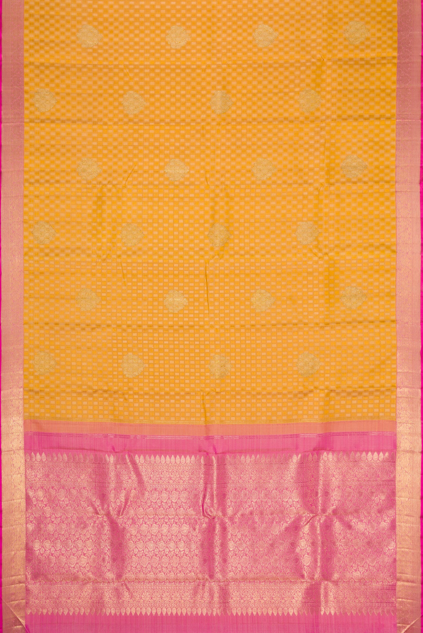 Flat view of Pure Silk Pure Zari Gold Dual Tone Kanjivaram Saree with Jacquard With Zari Butta on the body and Zari Border. 