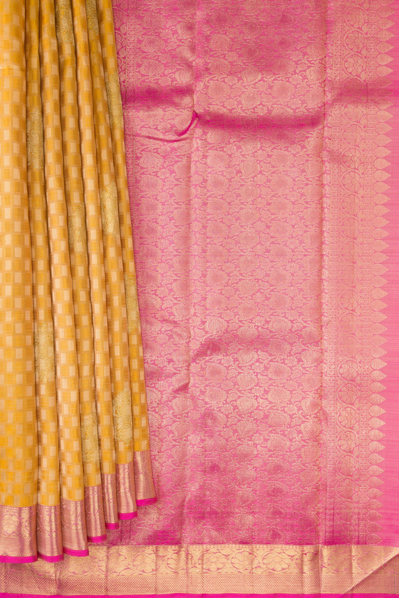 Pleats and pallu of Pure Silk Pure Zari Gold Dual Tone Kanjivaram Saree with Jacquard With Zari Butta on the body and Zari Border. 