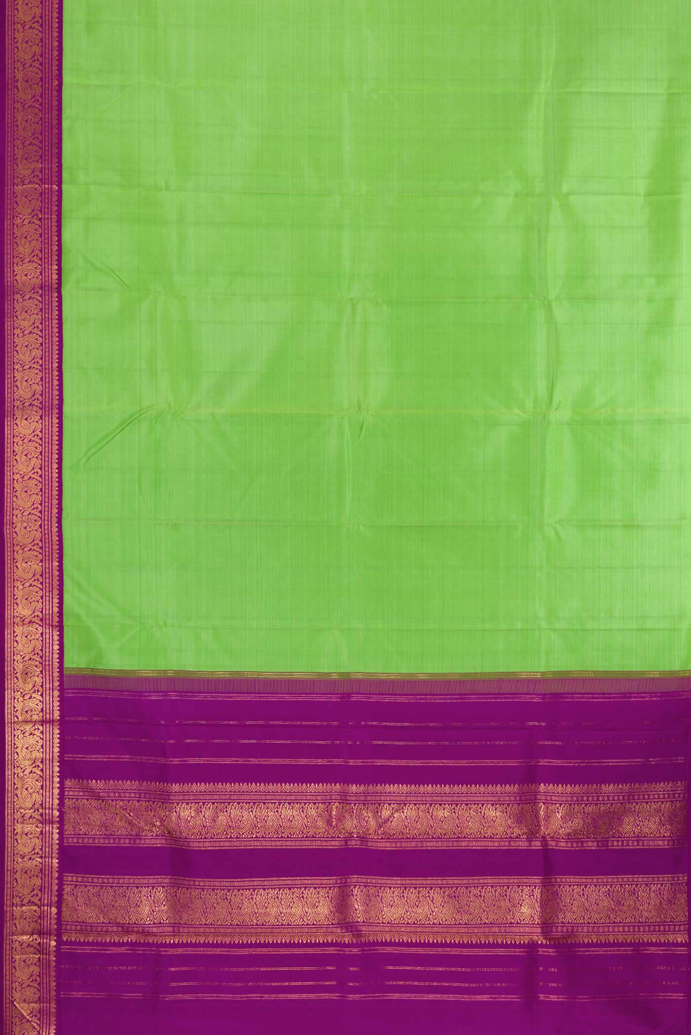 Flat view of Pure Silk Pure Zari Parrot Green Dual Tone Kanjivaram Saree with Plain Body and Zari Border. 