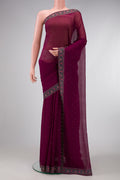 Maroon Dual Tone Chiffon Saree with Embroidery on the body and Embroidery Border.  displayed on a mannequin