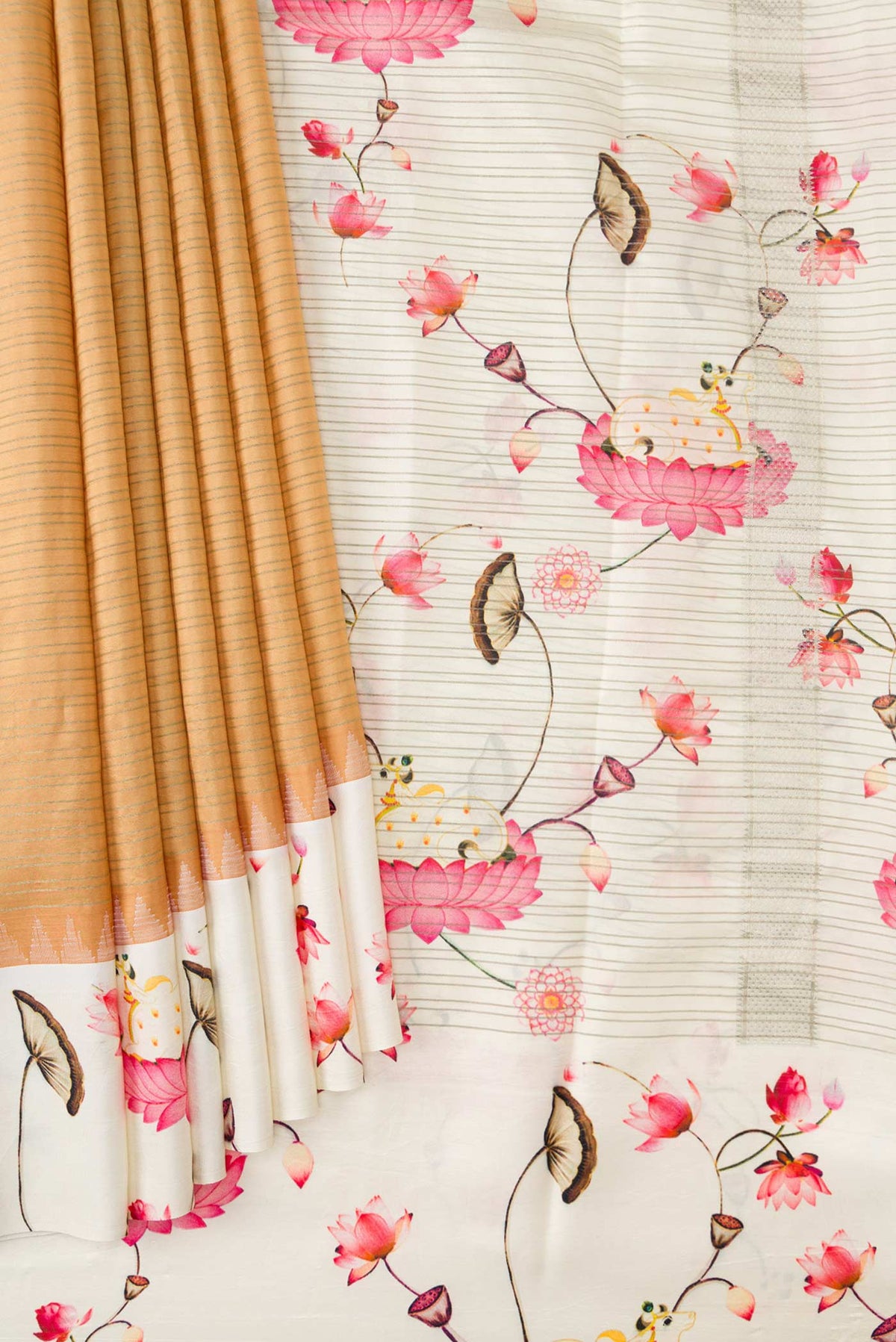 Pleats and pallu of Beige Dual Tone Kanchipuram Silk Saree with Stripes on the body and Printed Border