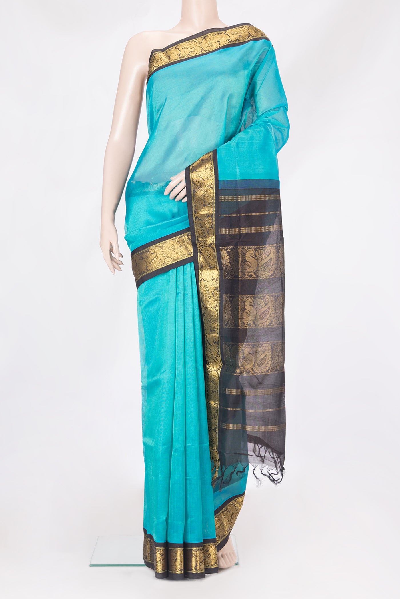 Sky Blue Silk Cotton Saree with Plain Body and Zari Border.  displayed on a mannequin