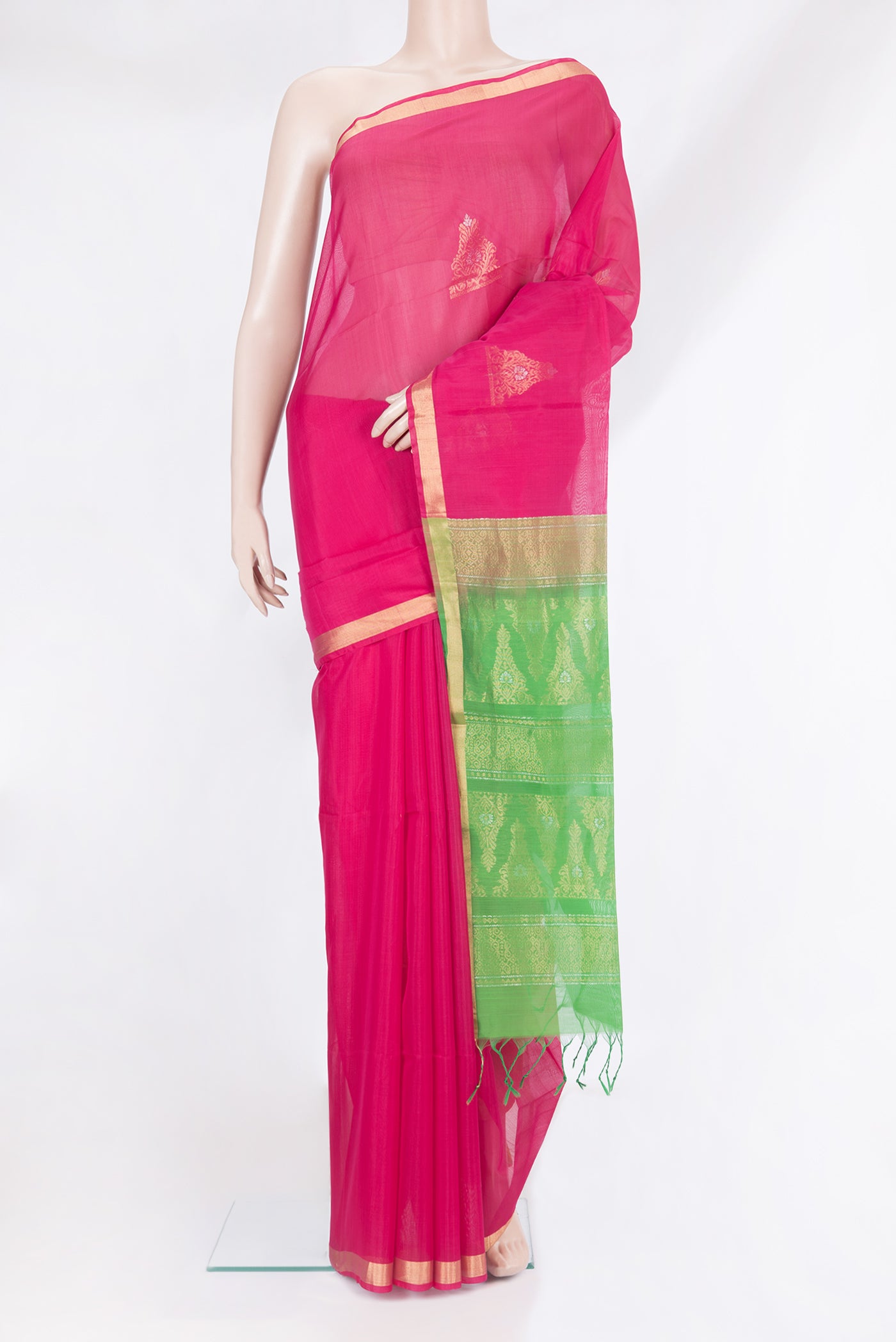 Dark Pink Silk Cotton Saree with Zari Butta on the body and Zari Border.  displayed on a mannequin