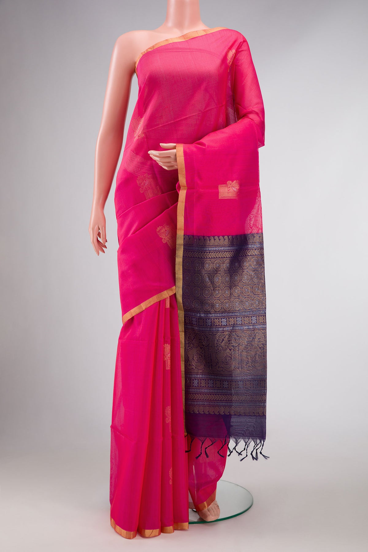 Dark Pink Dual Tone Silk Cotton Saree with Zari Butta on the body and Zari Border displayed on a mannequin