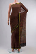 Rust Chanderi Silk Cotton SareePrinted design on the body and Zari Border displayed on a mannequin