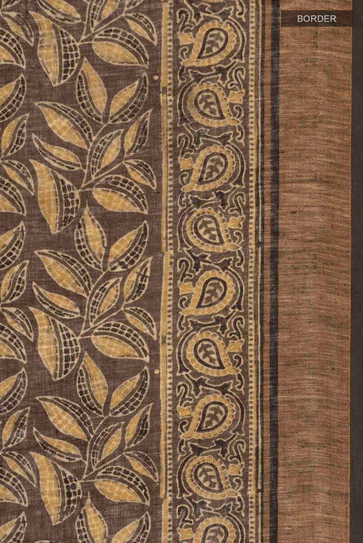 Border image of Green Linen Cotton SareePrinted design on the body and Zari Border