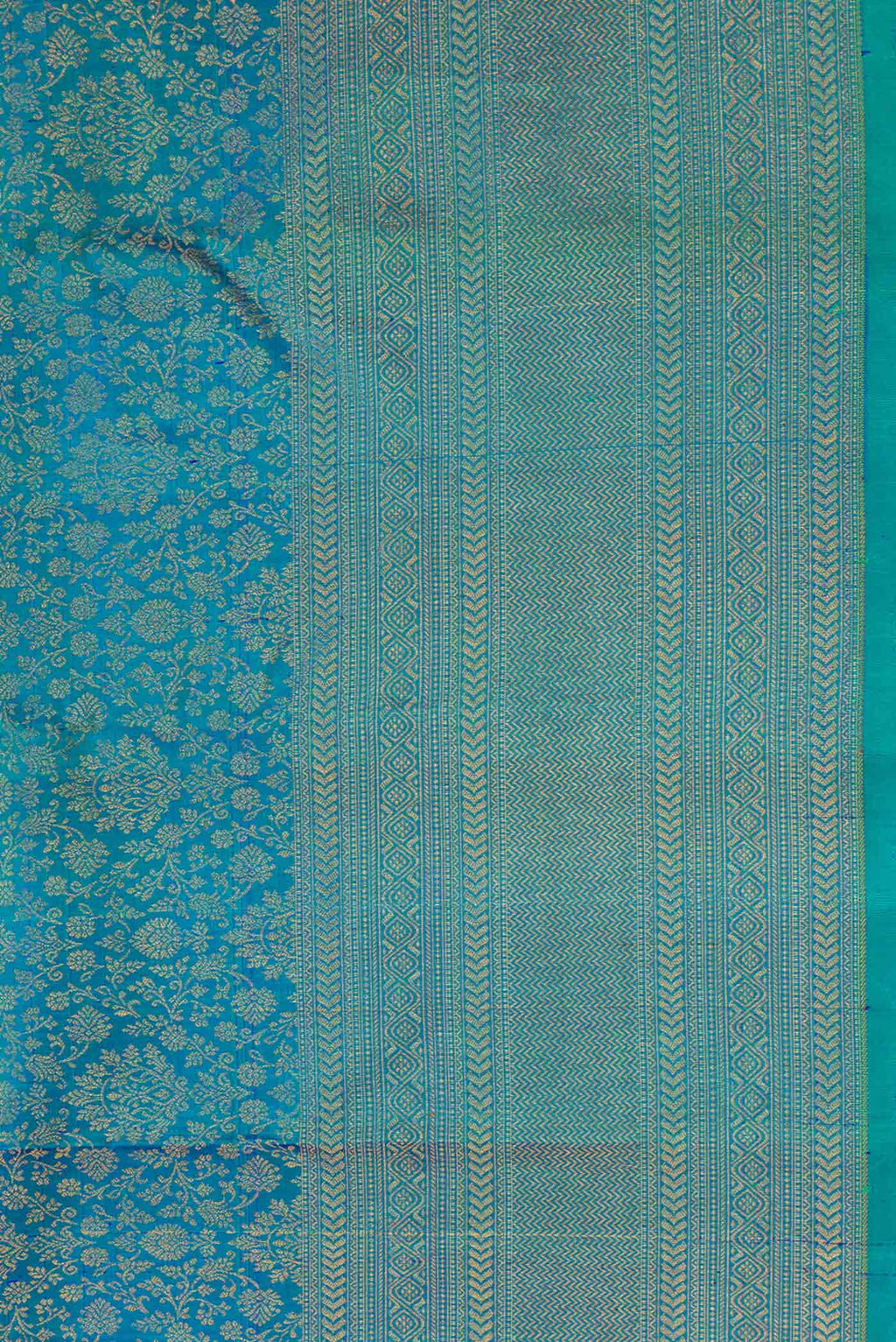 Border image of Peacock Blue Dual Tone Kanjivaram Silk Saree with Zari Brocade on the body and Zari Border. 