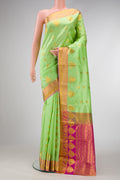 Parrot Green Dual Tone Kanjivaram Silk Saree with Jacquard With Zari Butta on the body and Fancy Border.  displayed on a mannequin