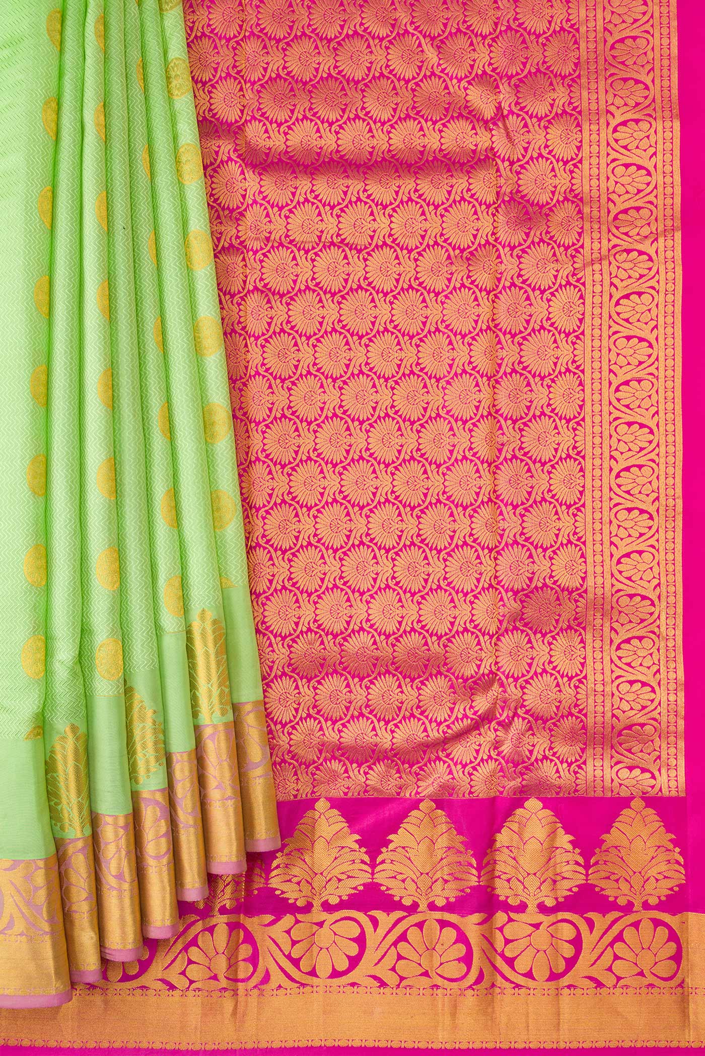 Pleats and pallu of Parrot Green Dual Tone Kanjivaram Silk Saree with Jacquard With Zari Butta on the body and Fancy Border. 