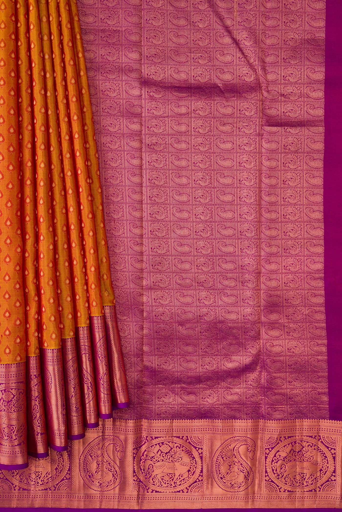 Pleats and pallu of Mustard Dual Tone Kanjivaram Silk Saree with Jacquard design on the body and Zari Border. 