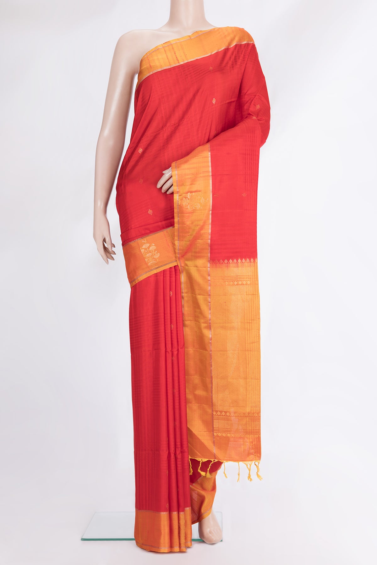 Pure Silk Red Soft Saree with Zari Butta on the body and Fancy Border.  displayed on a mannequin