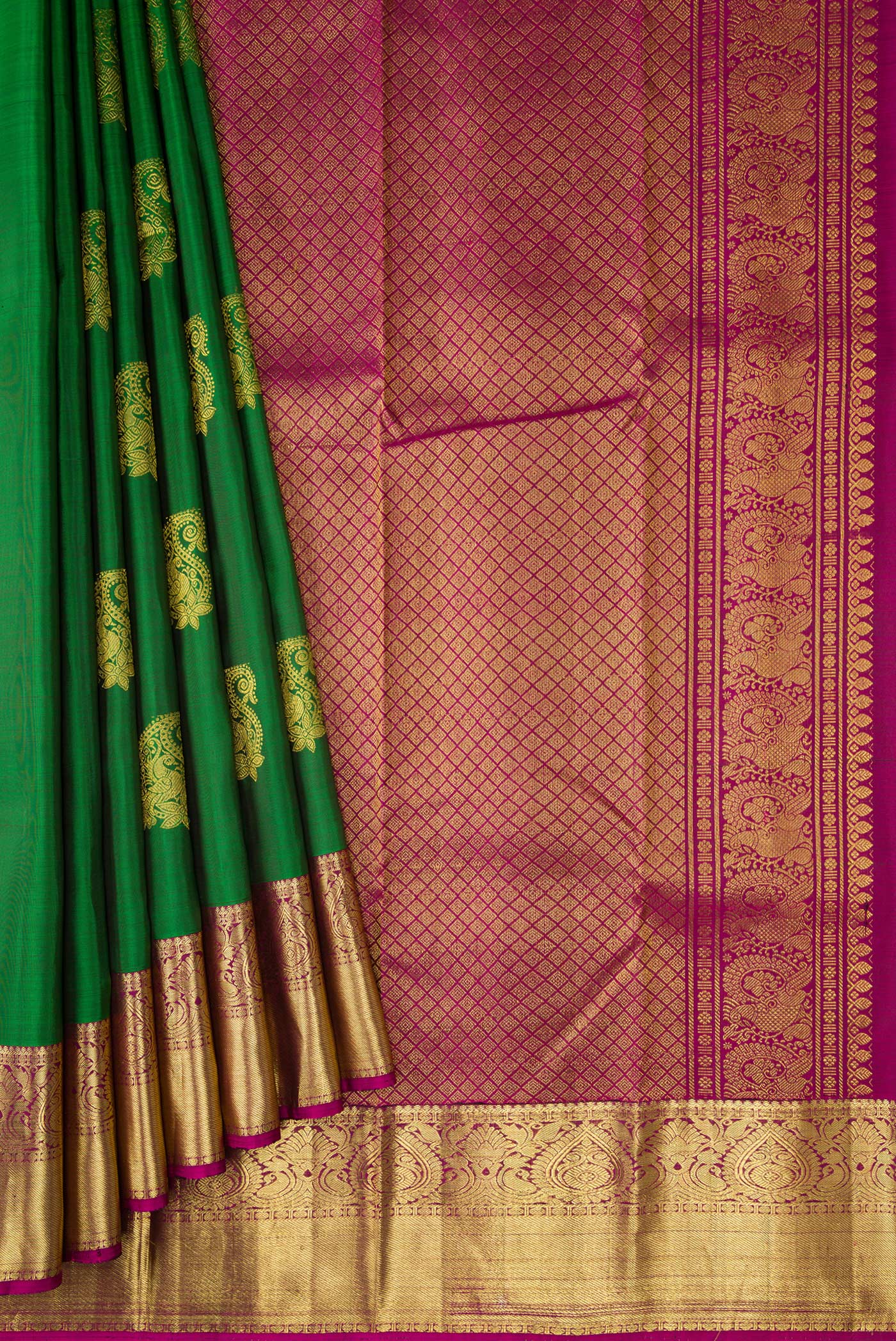 Pleats and pallu of Green Dual Tone Kanchipuram Silk Saree with Zari Butta on the body and Zari Border. 