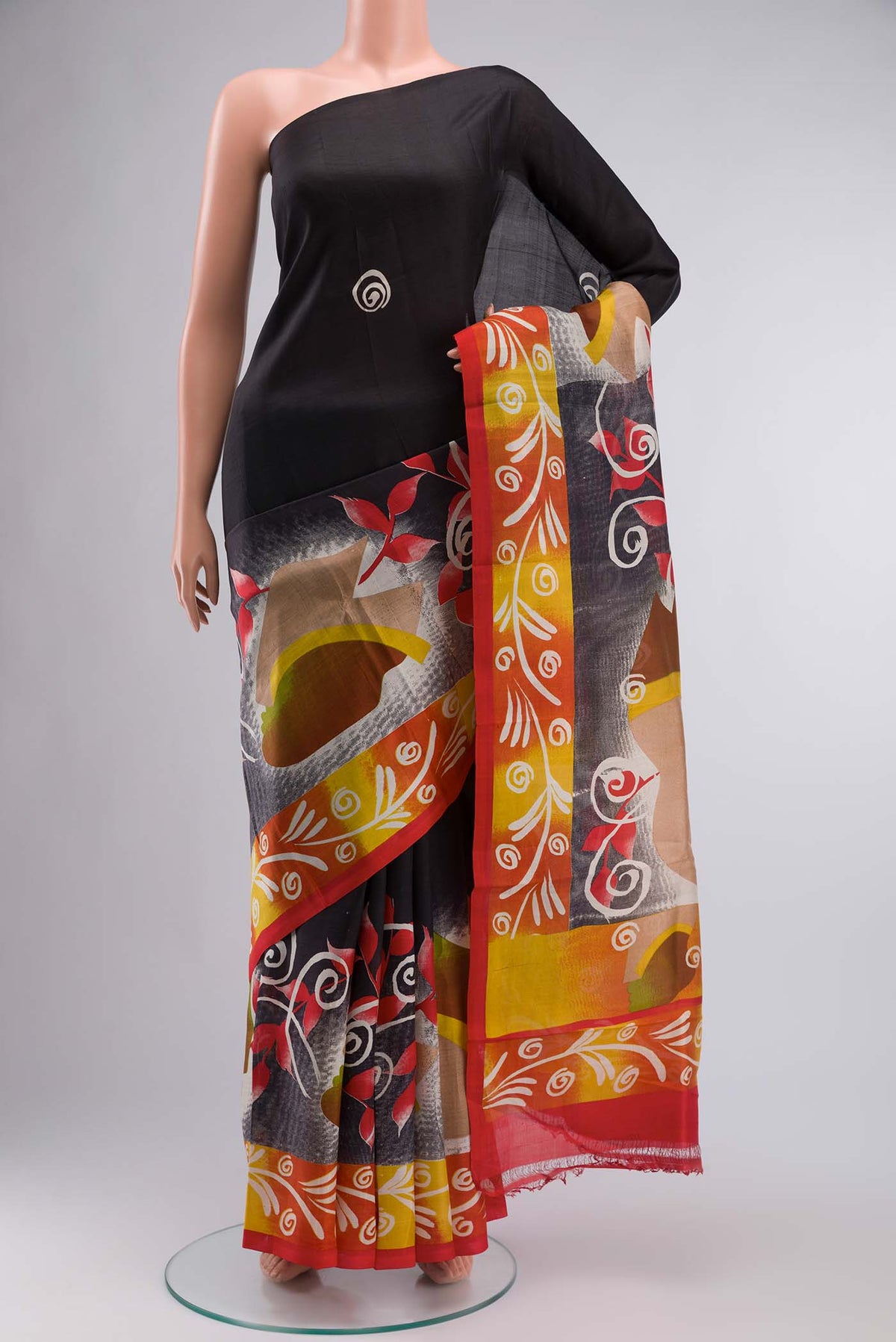Black Printed Silk Saree with Plain Body and Printed Border displayed on a mannequin