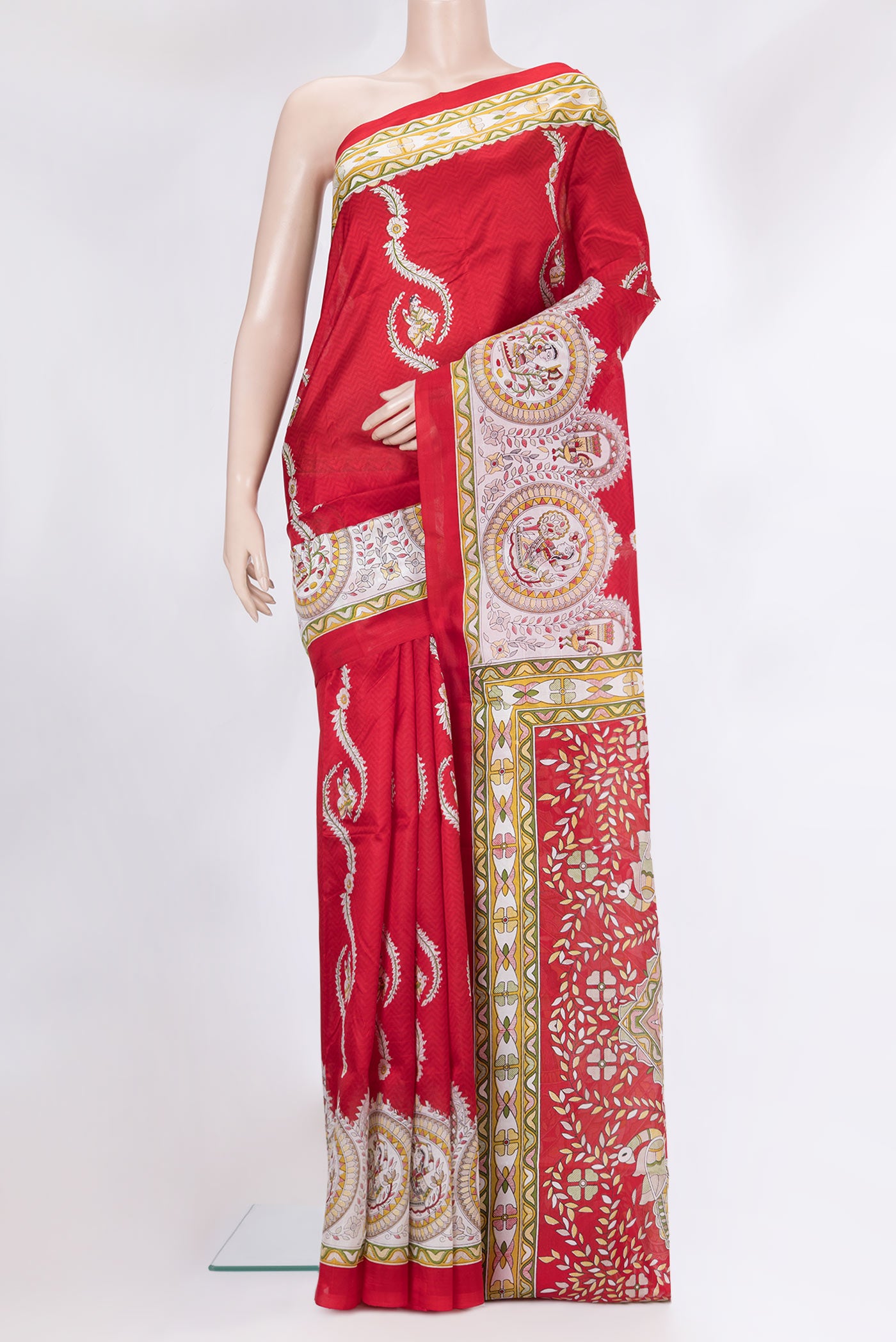Red Printed Silk Saree with Printed design on the body and Fancy Border.  displayed on a mannequin