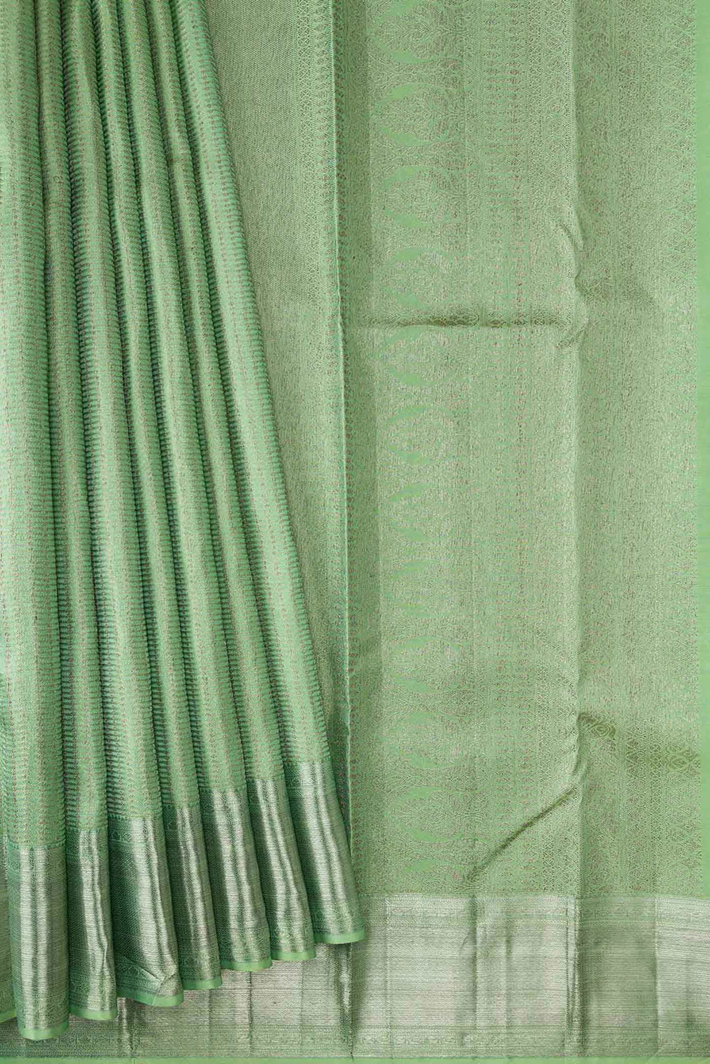 Pleats and pallu of Pista Green Dual Tone Kanjivaram Silk Saree with Zari Brocade on the body and Zari Border. 