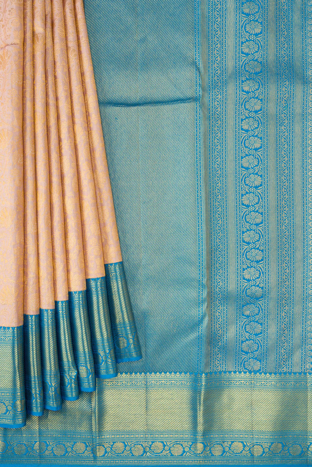 Pleats and pallu of Rose Gold Dual Tone Kanjivaram Silk Saree with Zari Brocade on the body and Zari Border. 