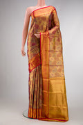 Pure Silk Pure Zari Gold Dual Tone Kanjivaram Tissue Saree with Zari Brocade on the body and Zari Border.  displayed on a mannequin