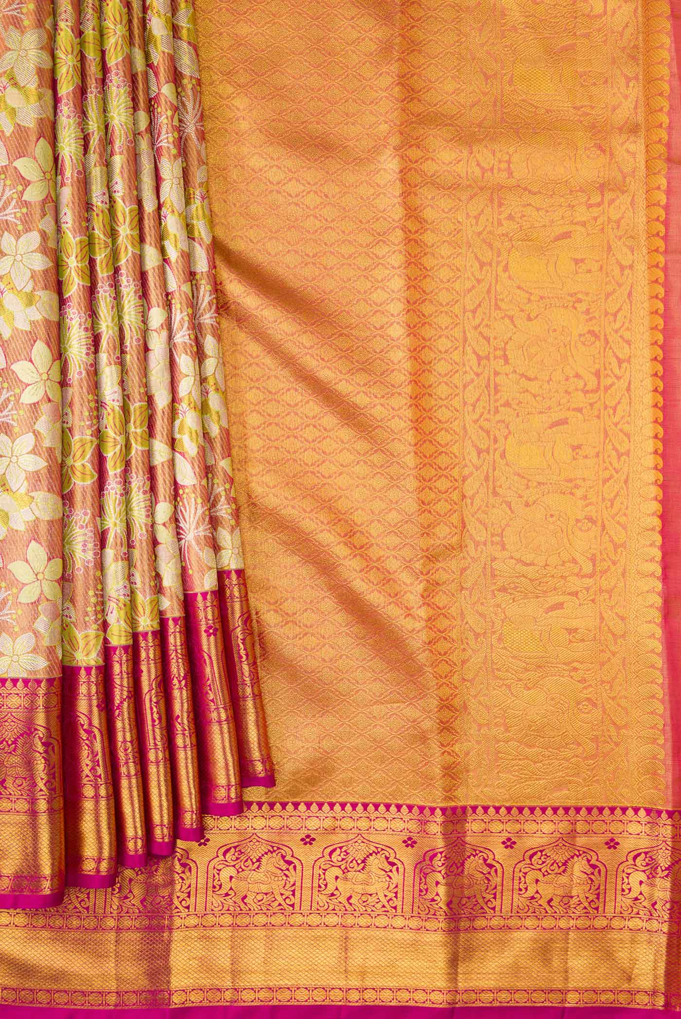 Pleats and pallu of Gold Dual Tone Kanjivaram Tissue Silk Saree with Zari Brocade on the body and Zari Border. 