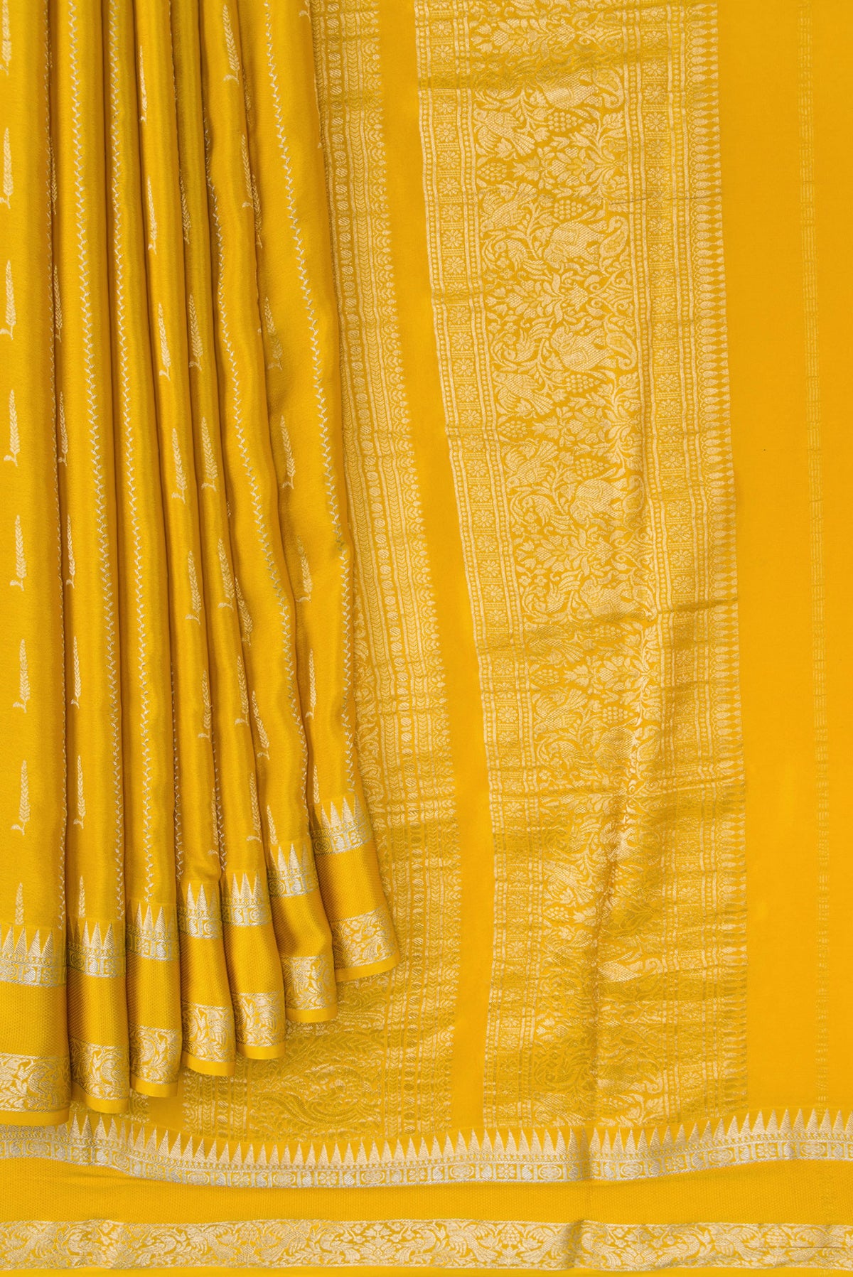 Pleats and pallu of Mustard Dual Tone Mysore Georgette Saree with Stripes on the body and Zari And Thread Border. 
