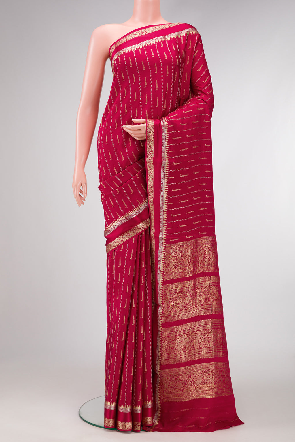 Maroon Dual Tone Mysore Georgette Saree with Stripes on the body and Zari And Thread Border.  displayed on a mannequin