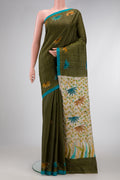 Green Dual Tone Tussar Silk Saree with Printed design on the body and Plain Border.  displayed on a mannequin