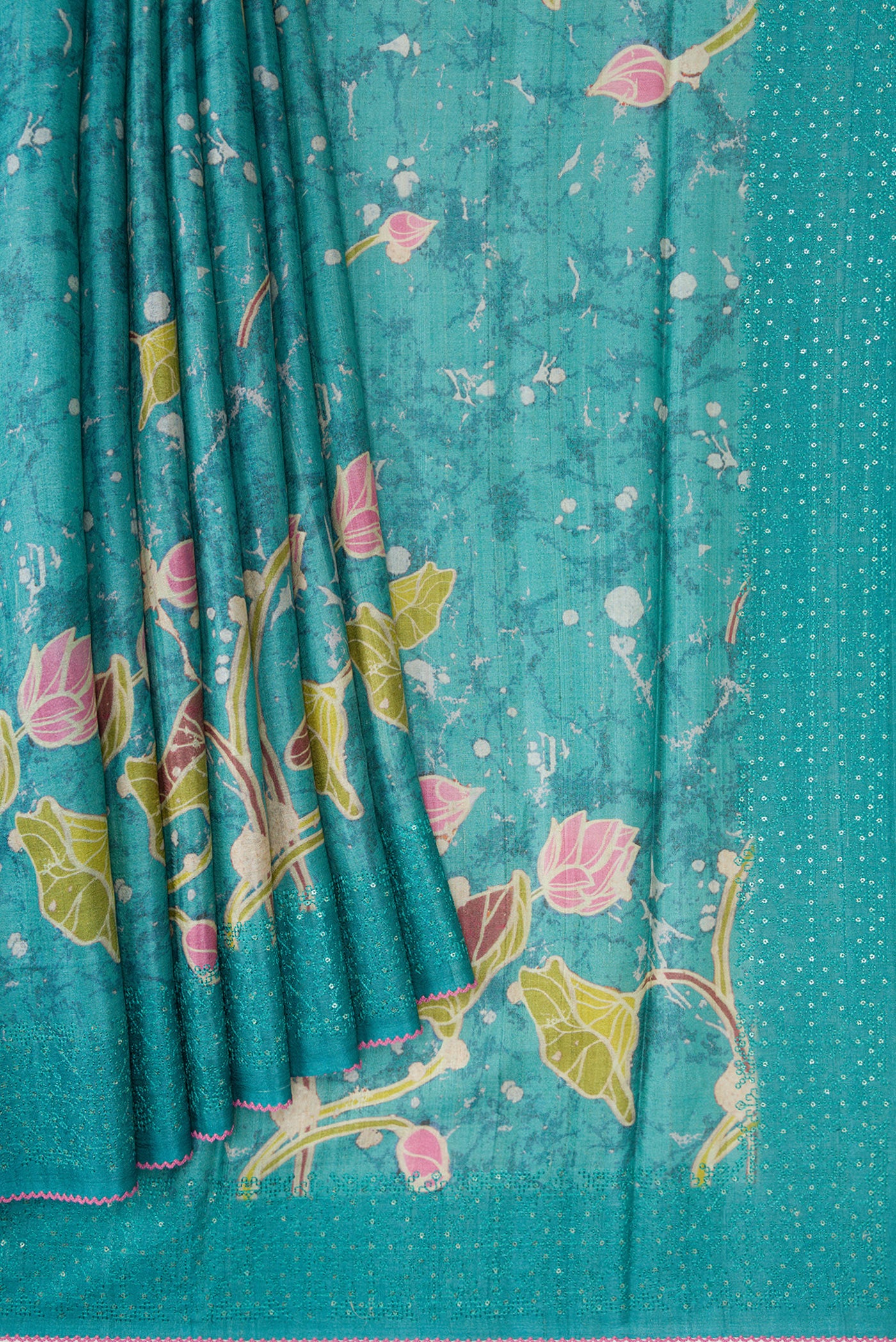 Pleats and pallu of Maya Blue Dual Tone Tussar Silk Saree with Printed design on the body and Embroidery Border. 