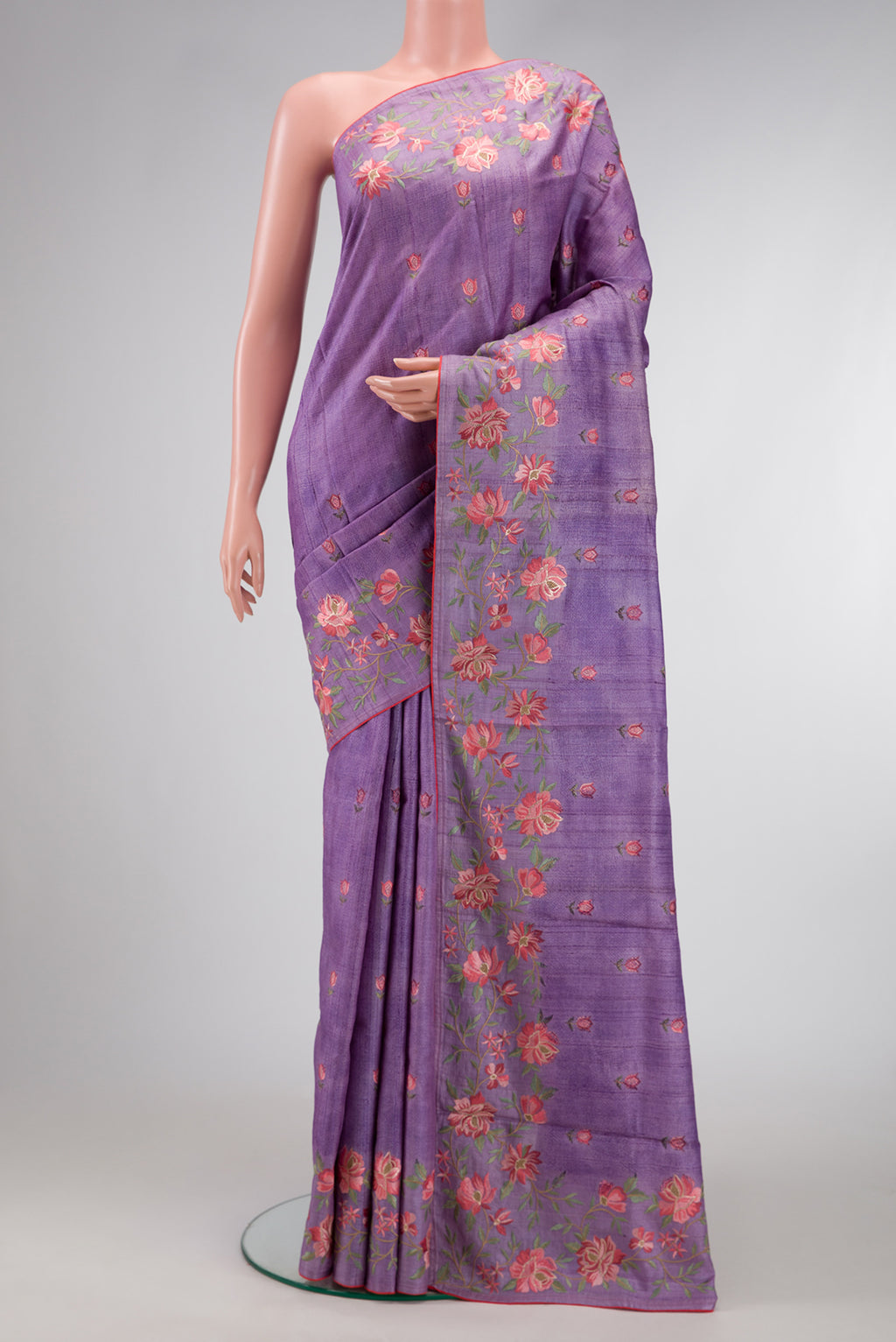 Lavender Dual Tone Tussar Silk Saree with Printed design on the body and Embroidery Border.  displayed on a mannequin