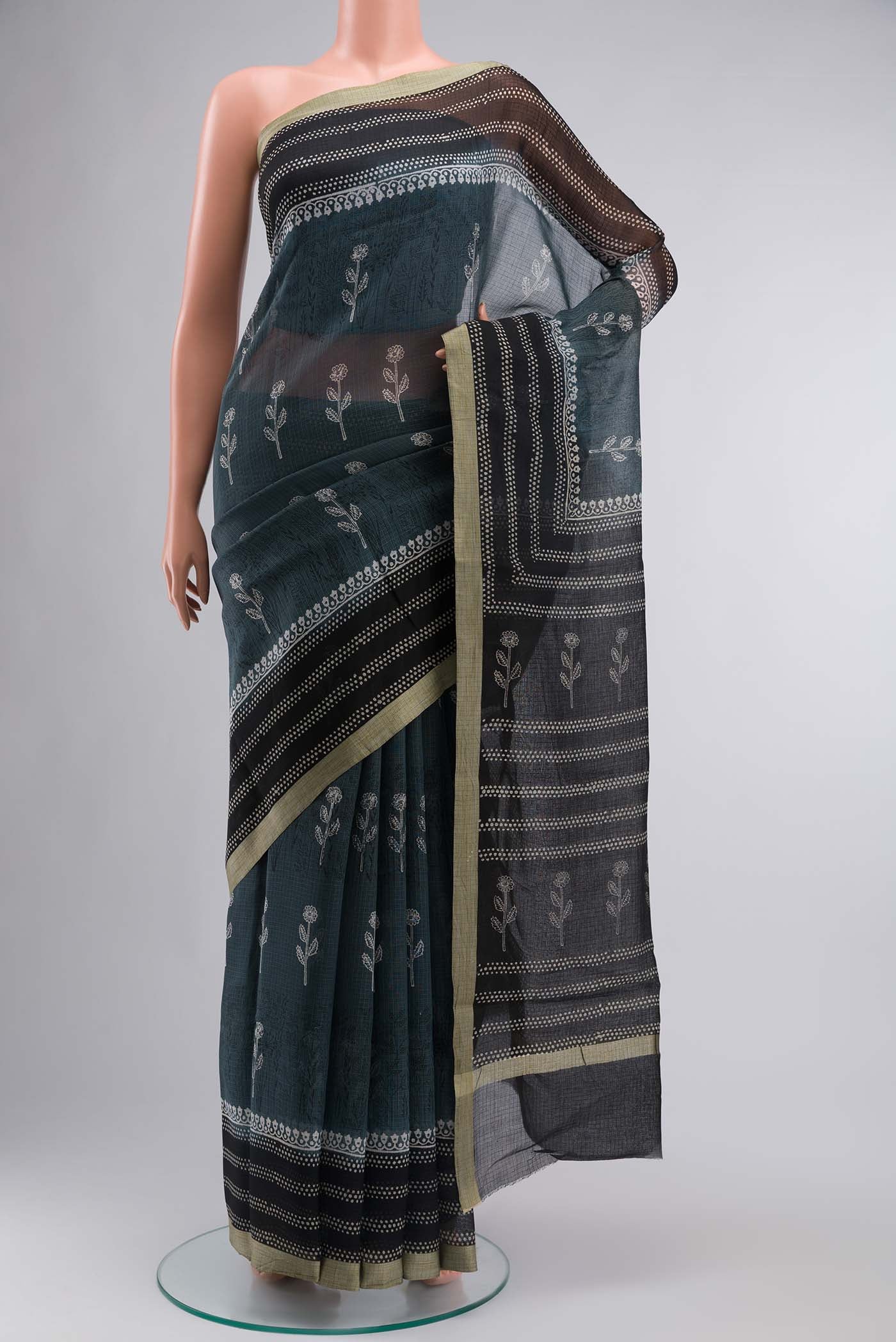 Grey Kota Cotton SareePrinted design on the body and Plain Border displayed on a mannequin