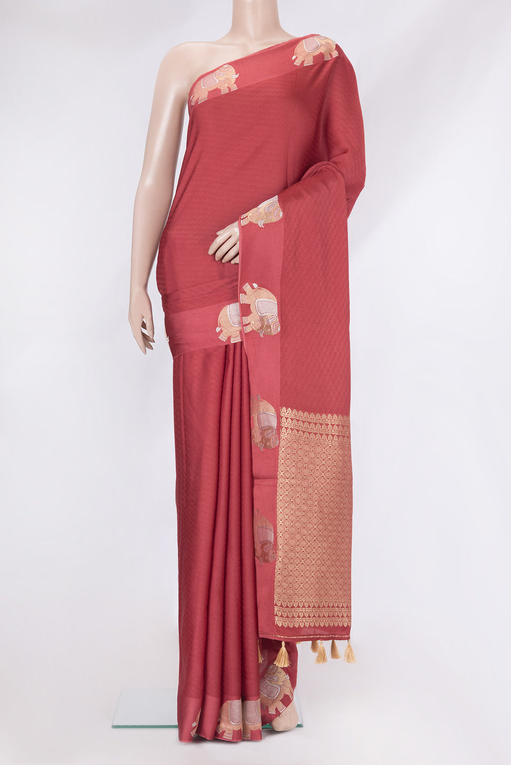 Maroon Blended Banarasi Silk Saree with Jacquard design on the body and Fancy Border.  displayed on a mannequin