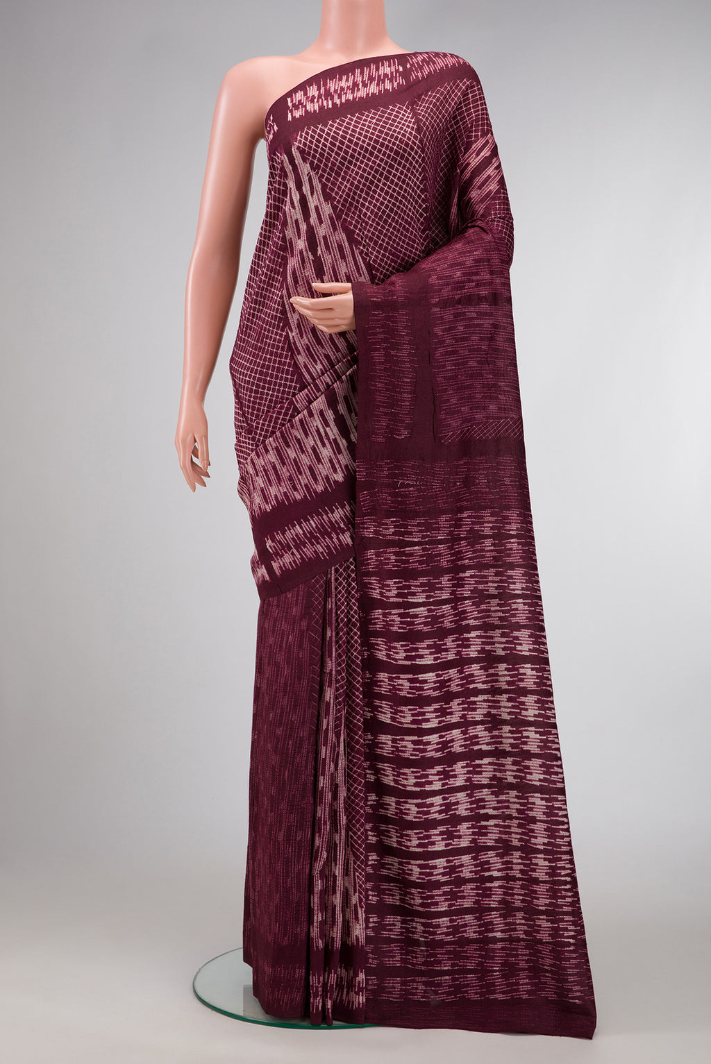 Maroon Dual Tone Tussar Silk Saree with Printed design on the body and Printed Border.  displayed on a mannequin