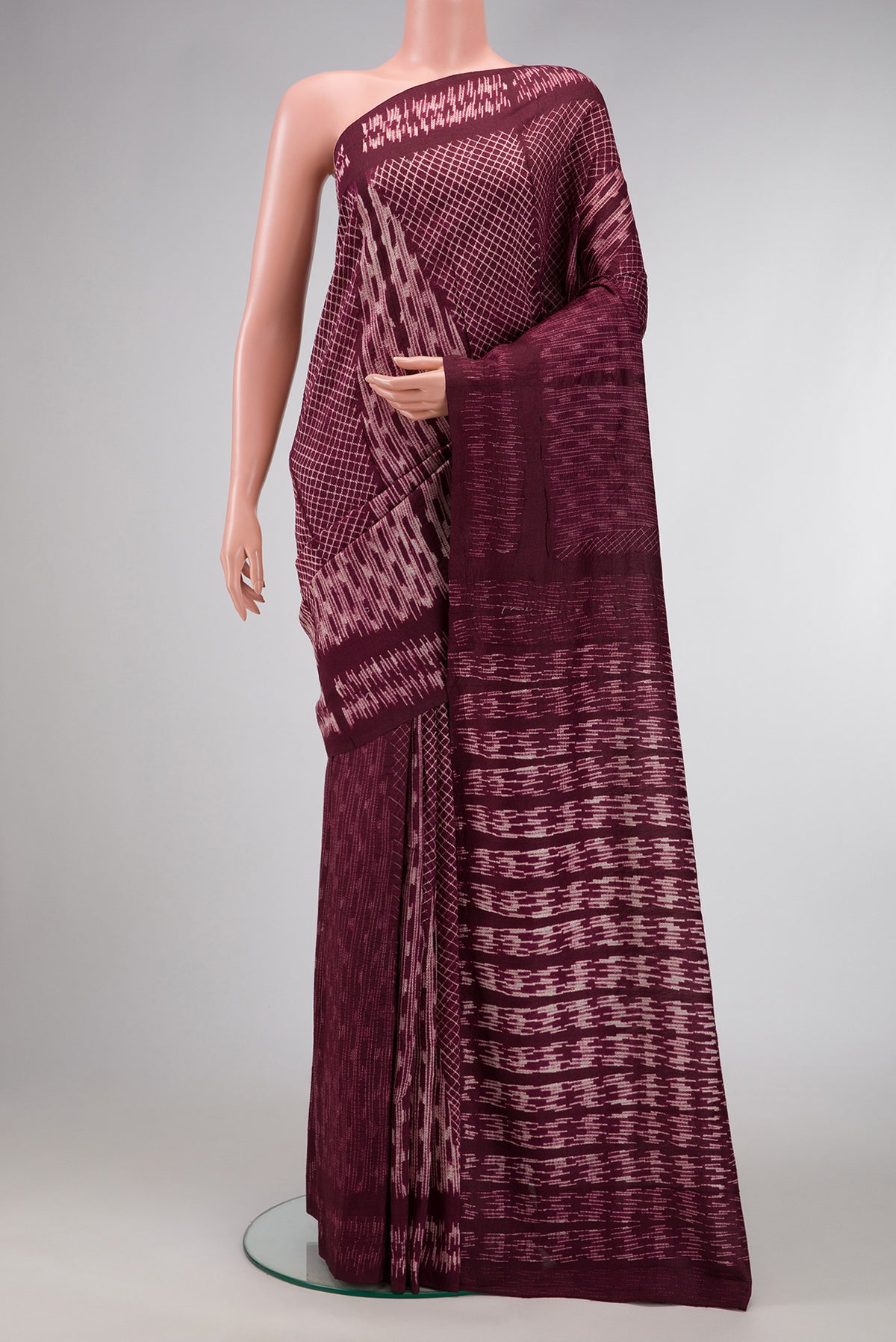 Maroon Dual Tone Tussar Silk Saree with Printed design on the body and Printed Border.  displayed on a mannequin