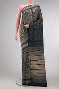 Navy Blue Dual Tone Tussar Silk Saree with Printed design on the body and Printed Border.  displayed on a mannequin