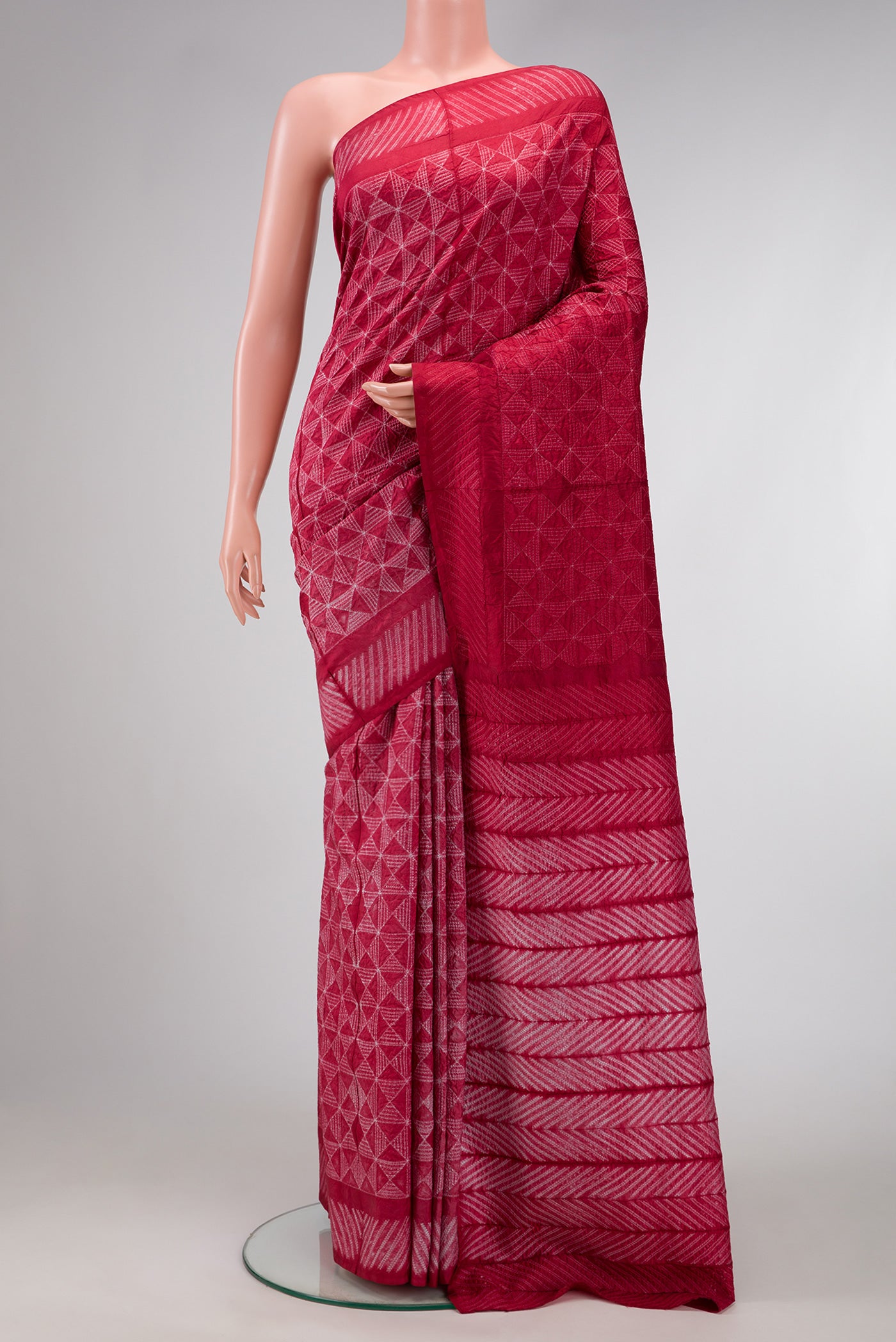 Maroon Dual Tone Tussar Silk Saree with Printed design on the body and Printed Border.  displayed on a mannequin