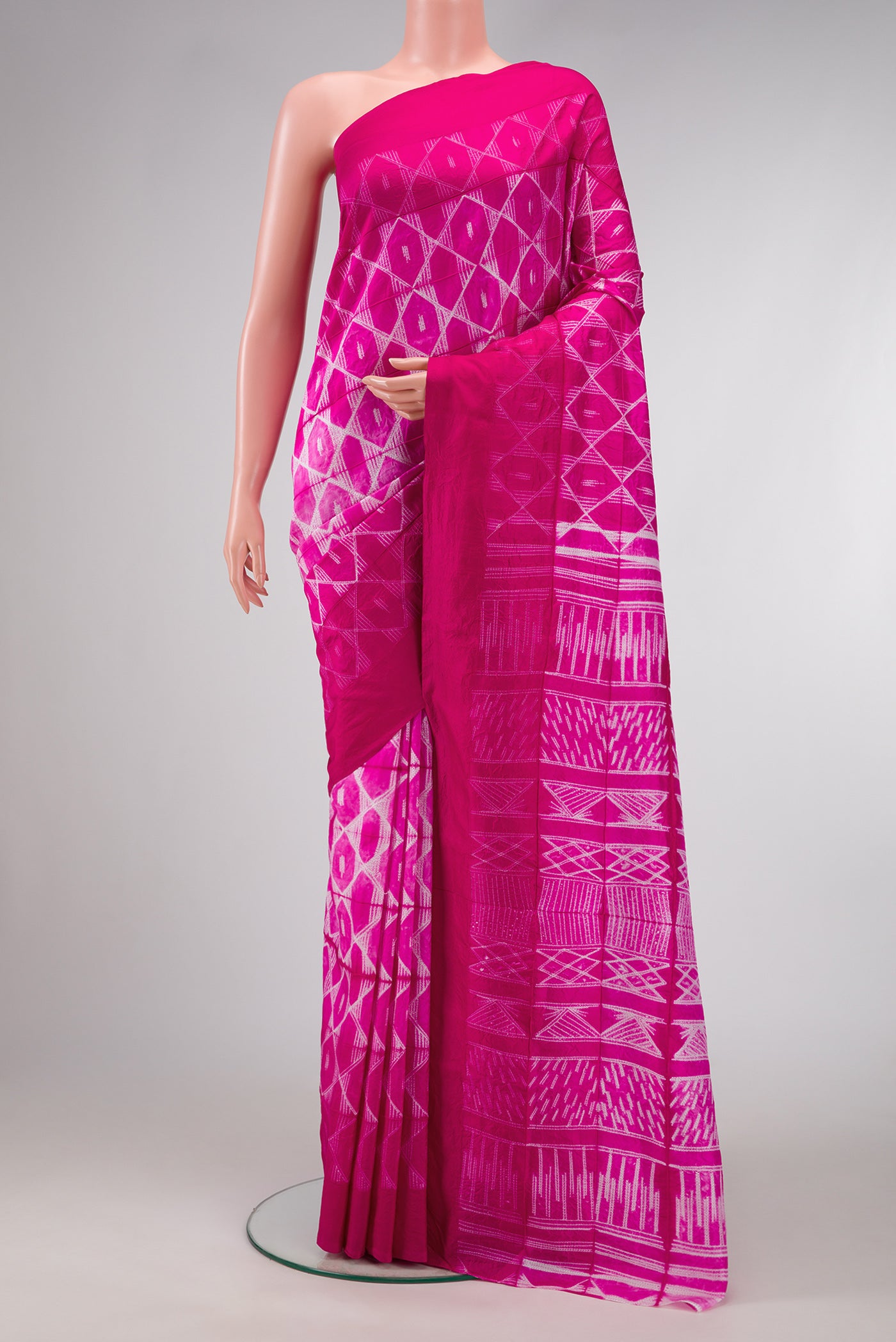 Pink Dual Tone Tussar Silk Saree with Printed design on the body and Plain Border.  displayed on a mannequin