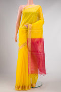 Yellow Dual Tone Silk Cotton Saree with Zari Butta on the body and Zari Border displayed on a mannequin
