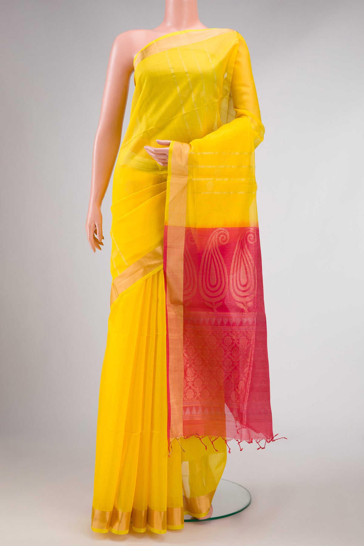 Yellow Dual Tone Silk Cotton Saree with Zari Butta on the body and Zari Border displayed on a mannequin