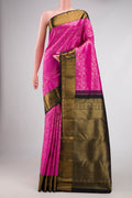 Pink Dual Tone Kanchipuram Silk Saree with Zari Brocade on the body and Zari Border.  displayed on a mannequin