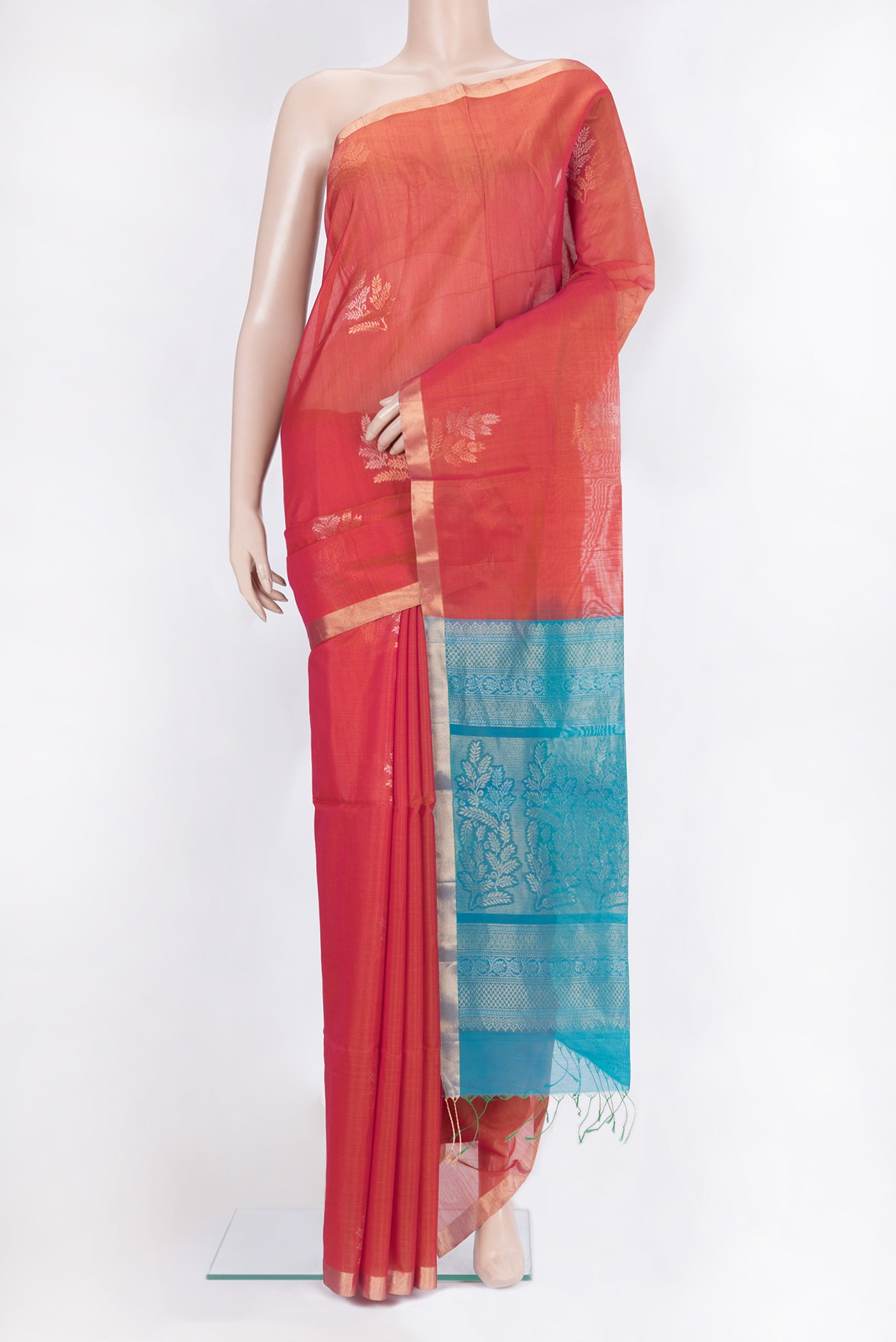 Red Silk Cotton Saree with Zari Butta on the body and Zari Border.  displayed on a mannequin