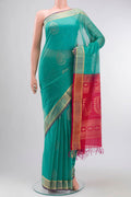 Sea Green Silk Cotton Saree with Zari Butta on the body and Zari Border displayed on a mannequin