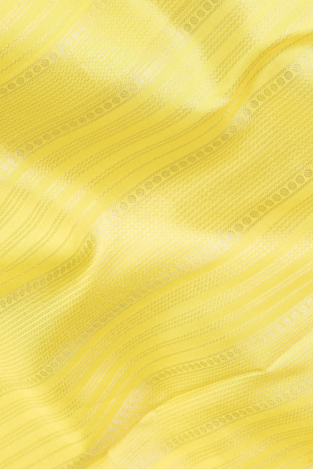 Close up of Pure Silk Lemon Yellow Dual Tone Soft Saree with Stripes on the body and Zari Border.  displaying folds