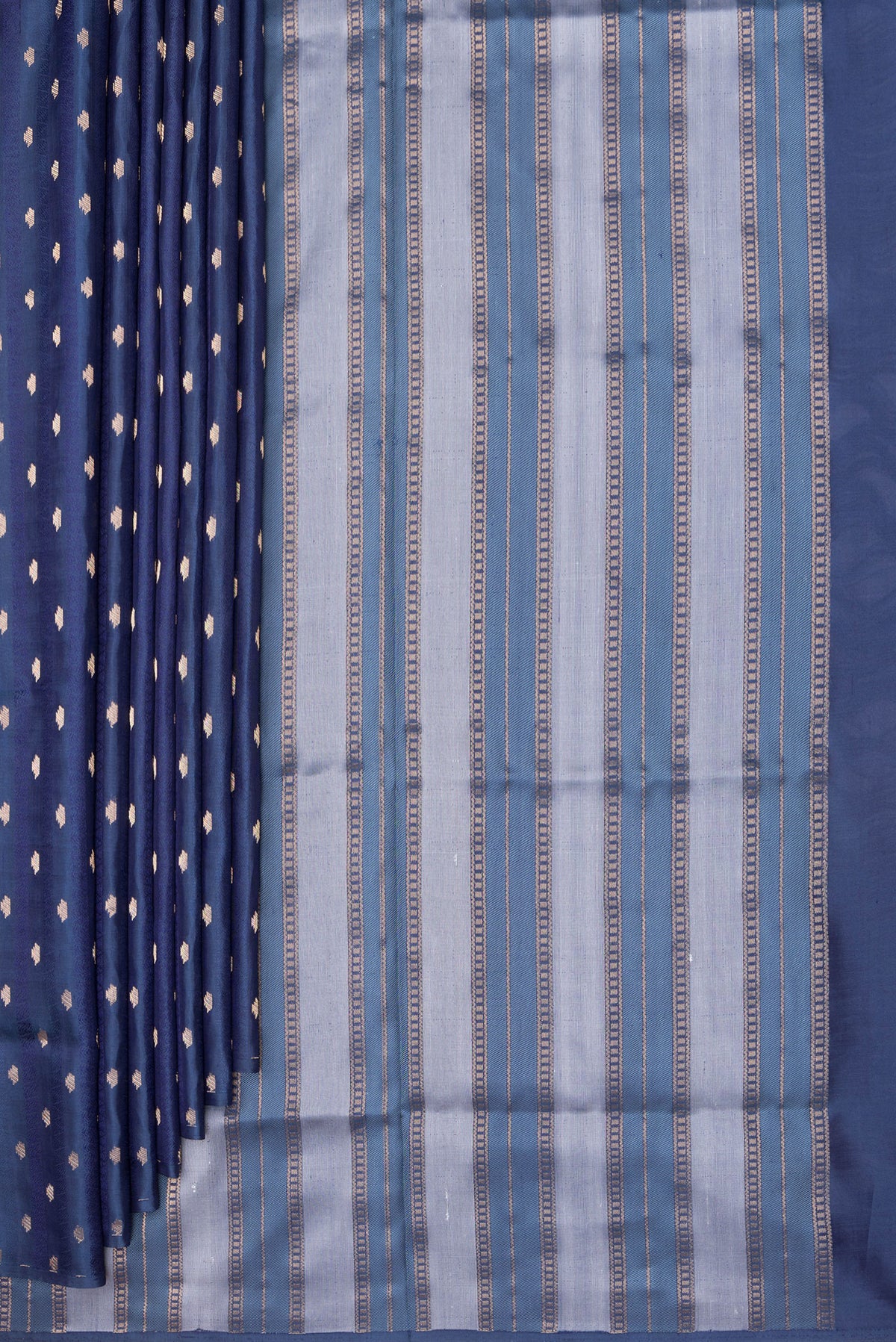 Pleats and pallu of Pure Silk Navy Blue Soft Saree with Jacquard With Zari Butta on the body and Without Border. 