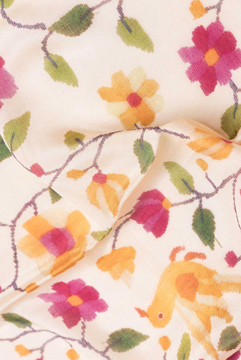 Close up of Sandal Dual Tone Blended Crepe Saree with Printed design on the body and Printed Border.  displaying folds