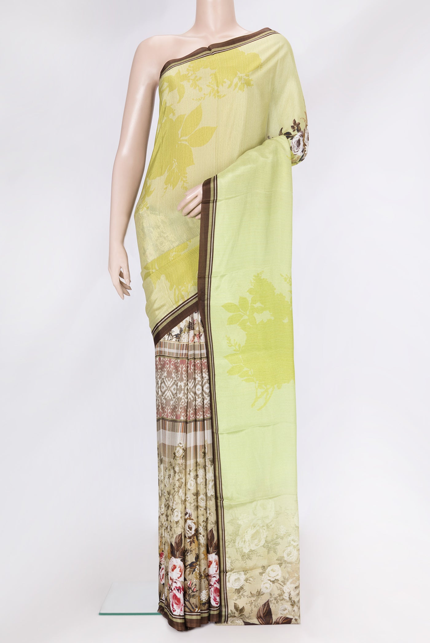 Green Dual Tone Blended Crepe Saree with Printed design on the body and Plain Border.  displayed on a mannequin