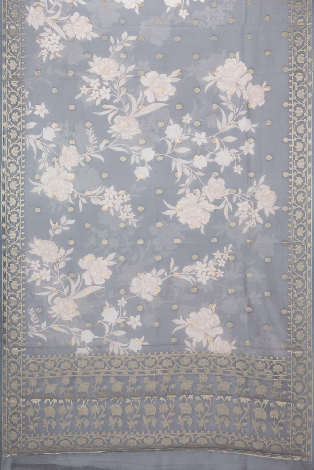 Flat view of Grey Chanderi Silk Cotton Saree with Printed design on the body and Zari Border. 