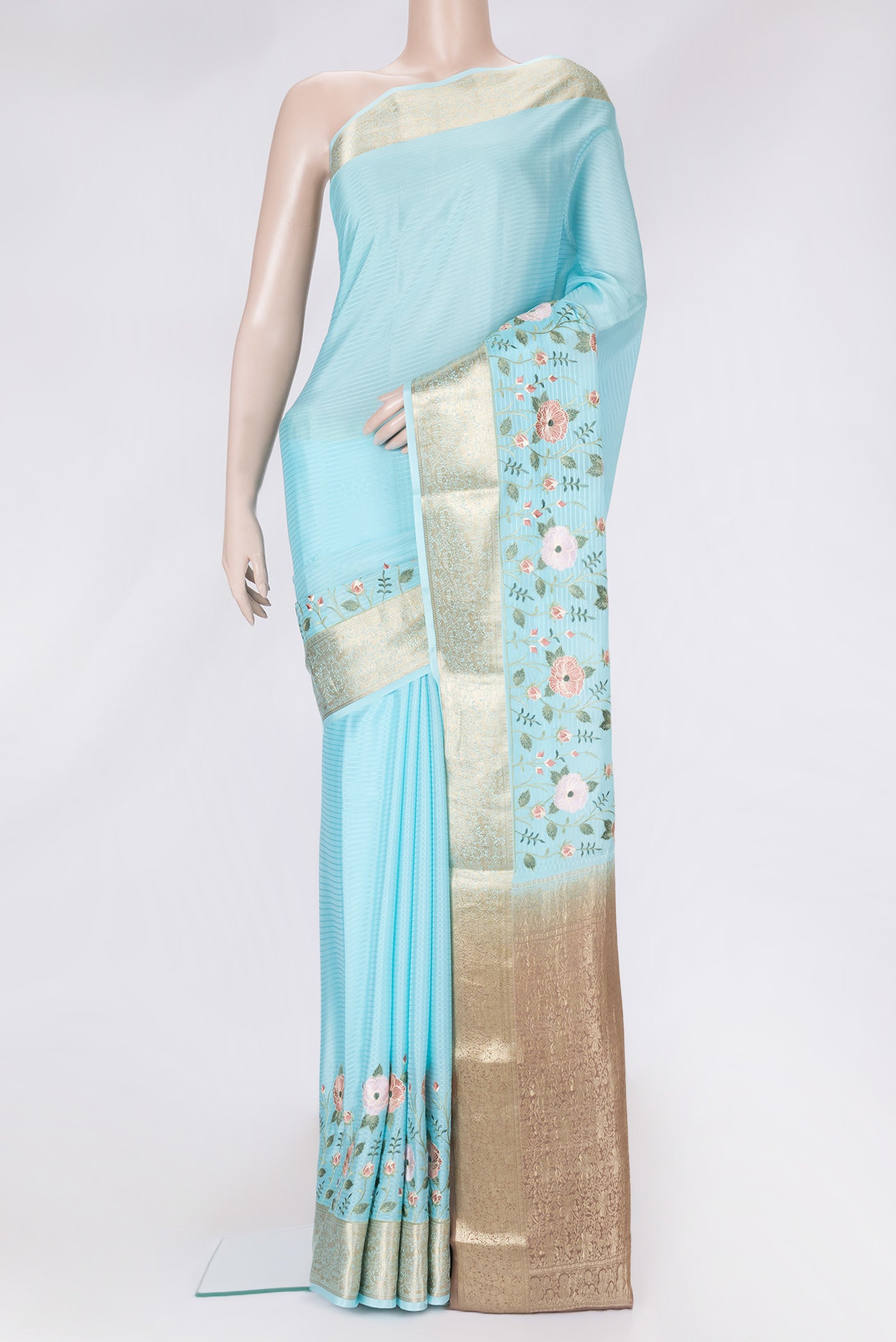 Sky Blue Dual Tone Mysore Silk Saree with Stripes on the body and Embroidery Border.  displayed on a mannequin