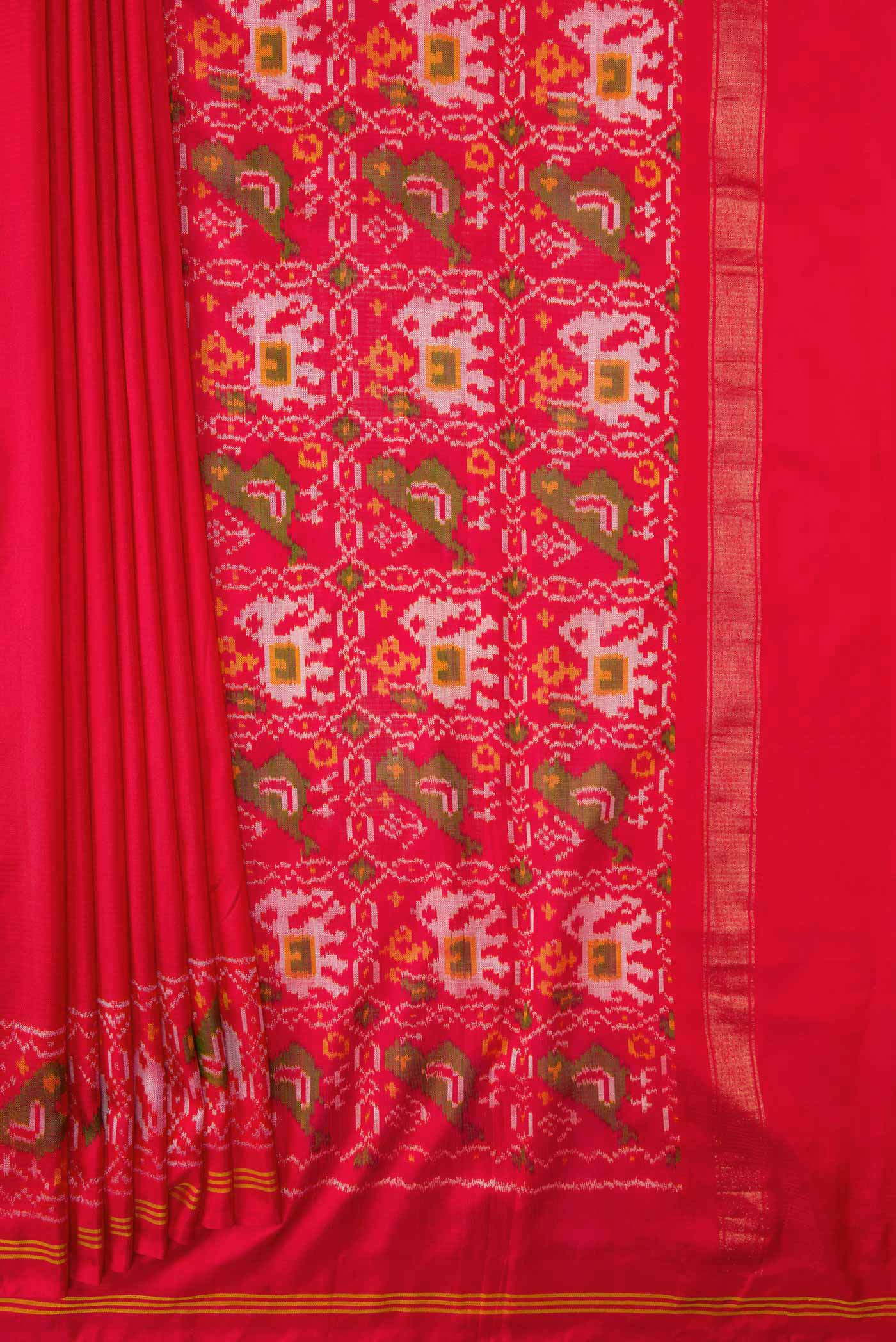 Pleats and pallu of Red Dual Tone Double Ikat Saree with Plain Body and Ikat Border