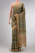 Mehandi Green Dual Tone Tussar Saree with Printed design on the body and Zari Border.  displayed on a mannequin