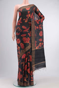 Black Tussar Silk SareePrinted design on the body and Zari Border displayed on a mannequin